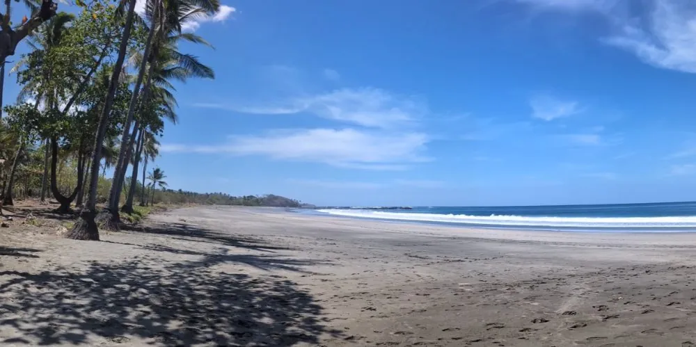Surf rolling in at Playa Venado